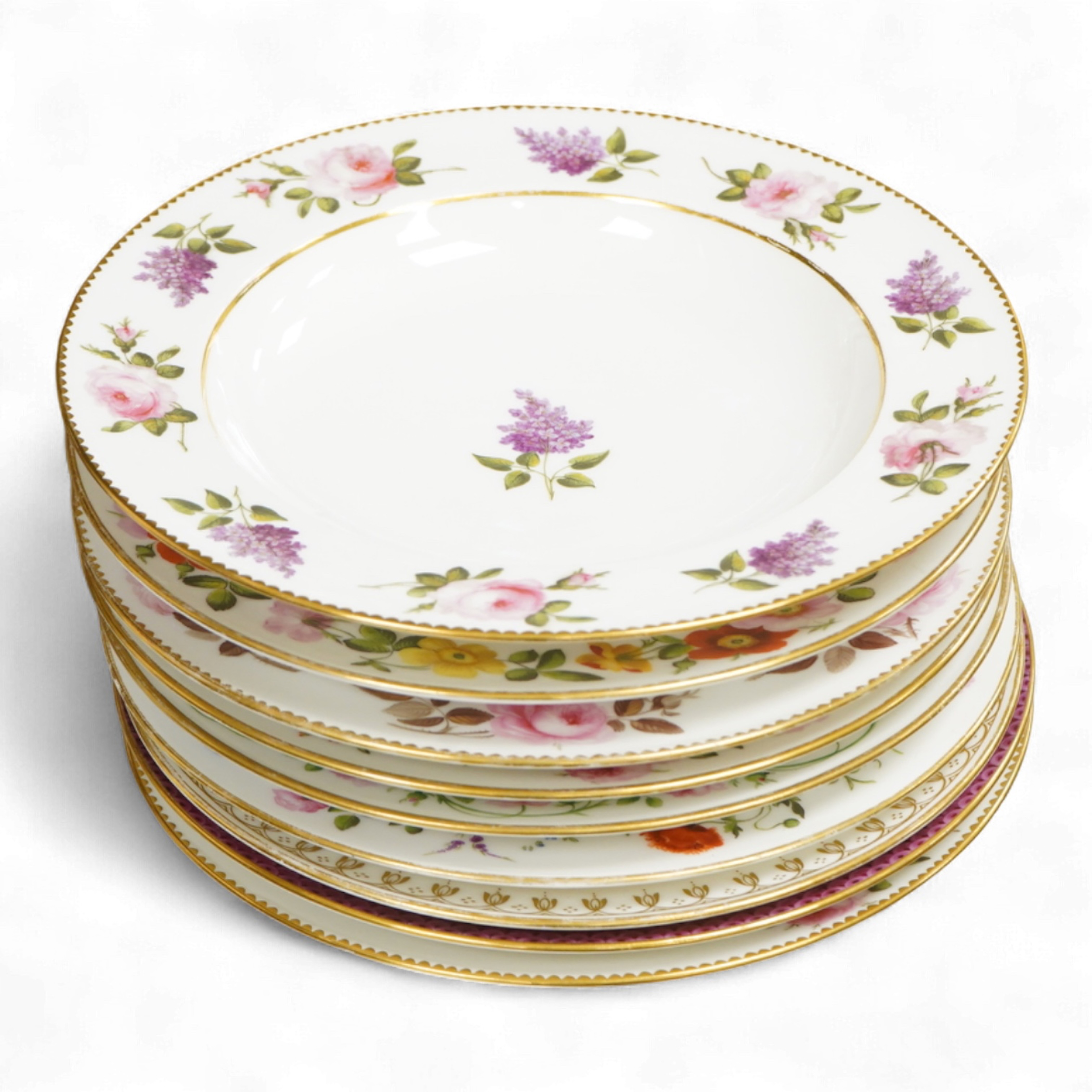 A group of nine mid 19th century Paris porcelain flower painted sample plates, 25cm in diameter